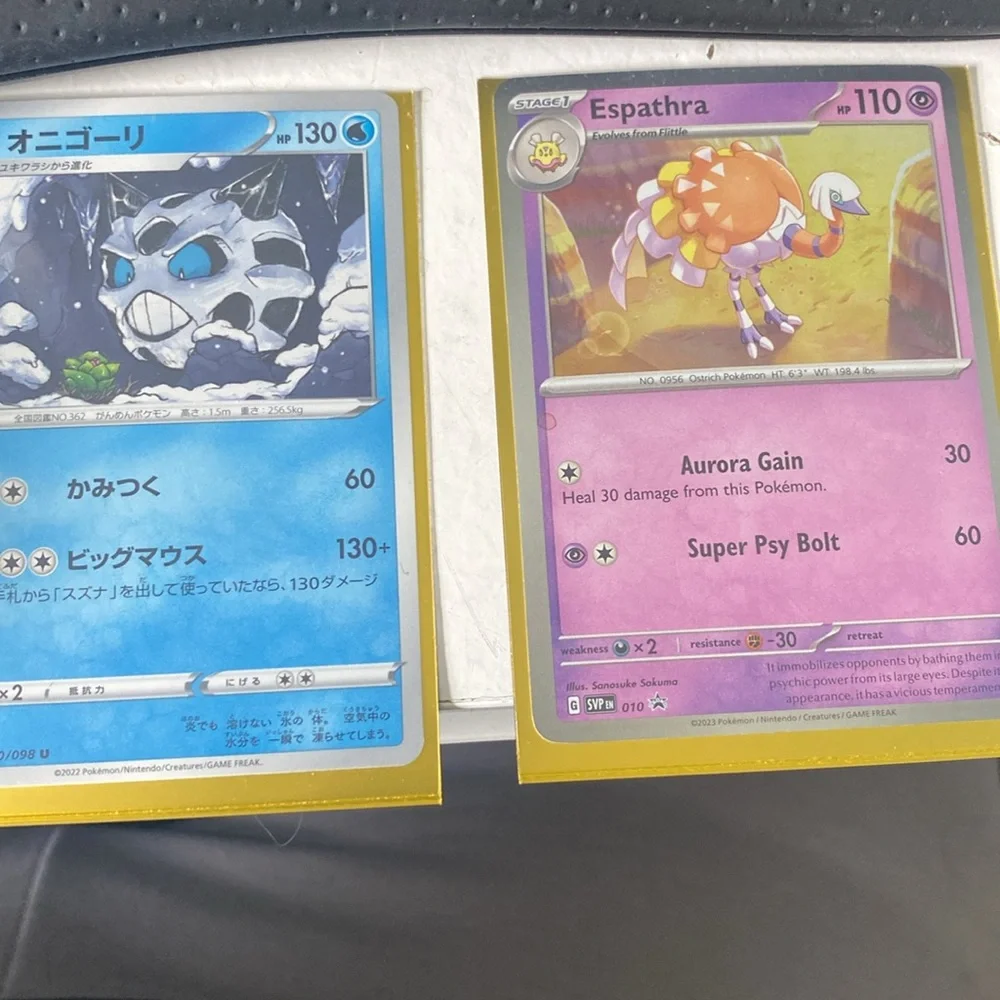 Pokemon Trading Cards Assortment - Blue, Yellow, Pink, Green